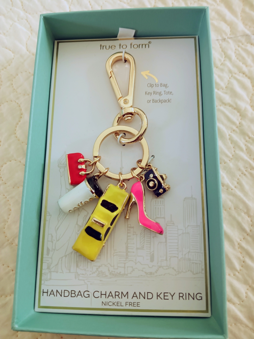 True to Form Gold-Tone Keyring with Pink Heel & Yellow Taxi Charms